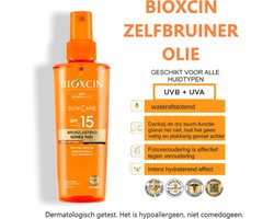Bioxcin Zonnebrandolie SPF 15 – Bronzende zonneolie – Voor alle huidtypes – Hypoallergeen – Met cacaoboter & wortelolie – Natuurlijke bruining & intense hydratatie – 200 ml