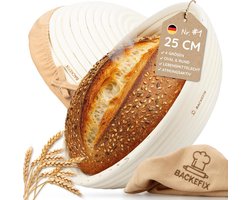 Ronde handgemaakte rijsmand van rotan met linnen doek voor brood bakken