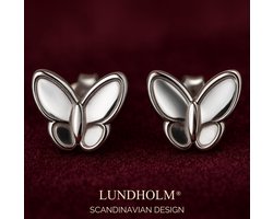 Lundholm Oorknopjes Meisjes Vlinder - Premium Stainless Steel Jewellery - Kleine Zilver kleurige Oorbellen (0.6 cm) - Cadeautje Meisje my - Luxe Geschenkverpakking